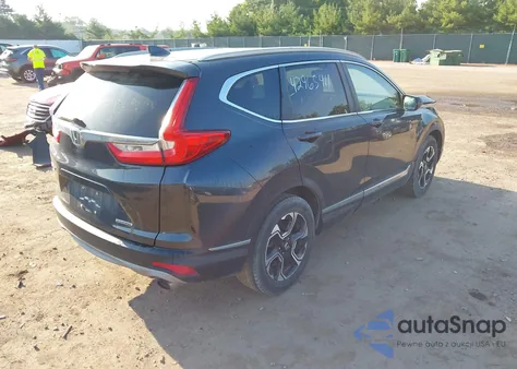 2017 Honda Cr-V Touring z USA, uszkodzony, nr VIN 7FARW1H93HE040069
